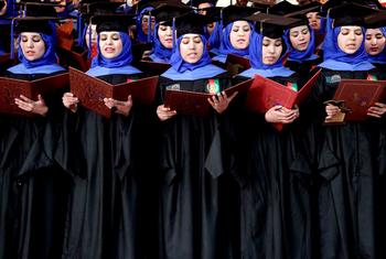 Afghan students perform during graduation at their degree-award ceremony at a university in Herat, Afghanistan. 