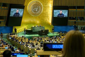 Volodymyr Zelenskyy (at podium and on screens), President of Ukraine, addresses the general debate of the General Assembly’s 79th session