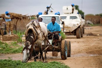 UNAMID peacekeepers patrol the Kalma Camp for internally displaced people in Nyala, South Darfur, Sudan